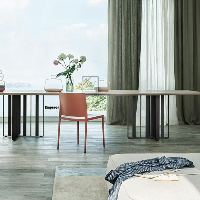 Premium dining table made of Italian laminate stone, specially designed for modern square style villas.