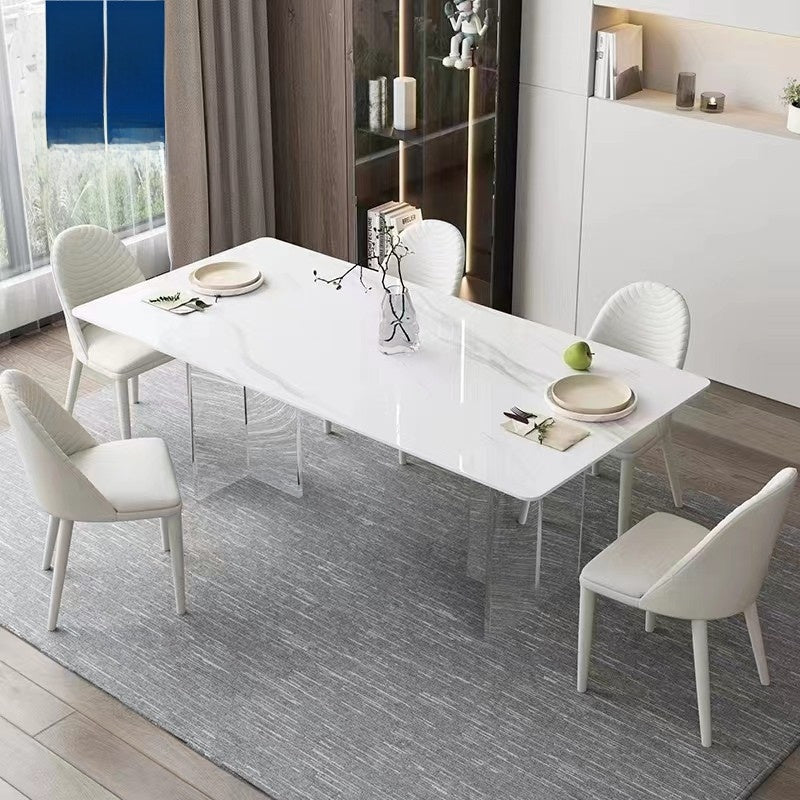 Modern dining table, floating style, minimalist design, acrylic or stone material, square shape, suitable for small homes.