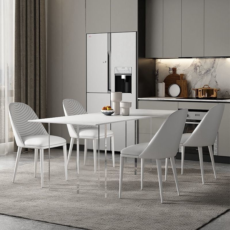 Modern dining table, floating style, minimalist design, acrylic or stone material, square shape, suitable for small homes.