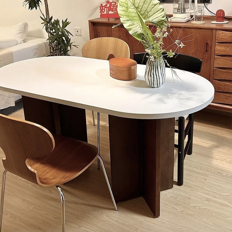 French-Nordic Style Oval Dining Table Set Simple and chic wooden table with chairs, suitable for small spaces.