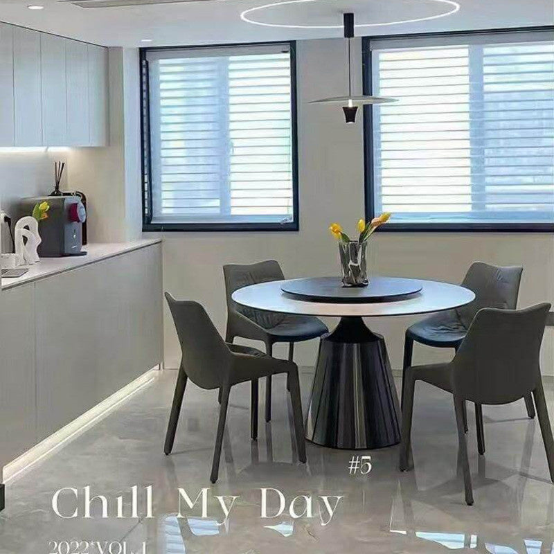 Elegant and simple marble dining table with round rotating base, modern Italian style, premium grade for families.