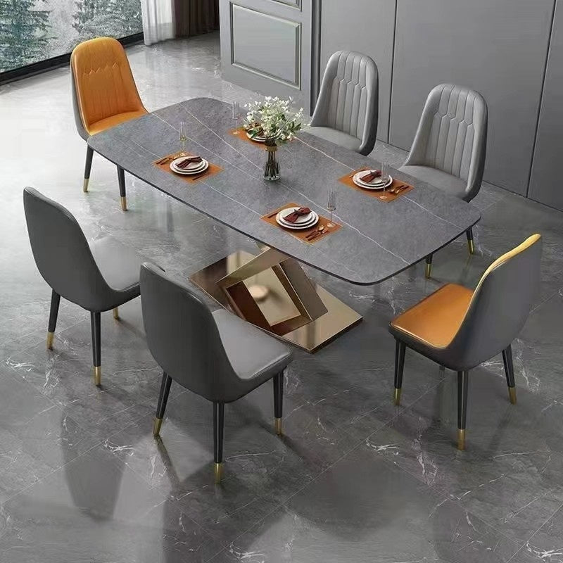 Italian dining table, luxurious, smooth surface, small artificial stone slab. Suitable for condos, stainless steel base, durable, modern.