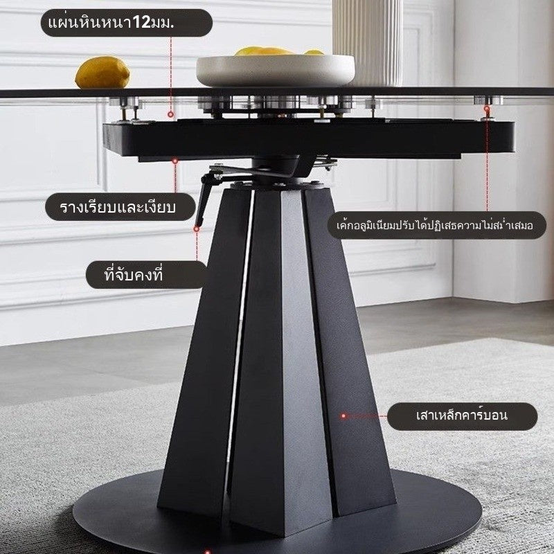 Simple modern black slate table with extendable circular top, ideal for any dining space.