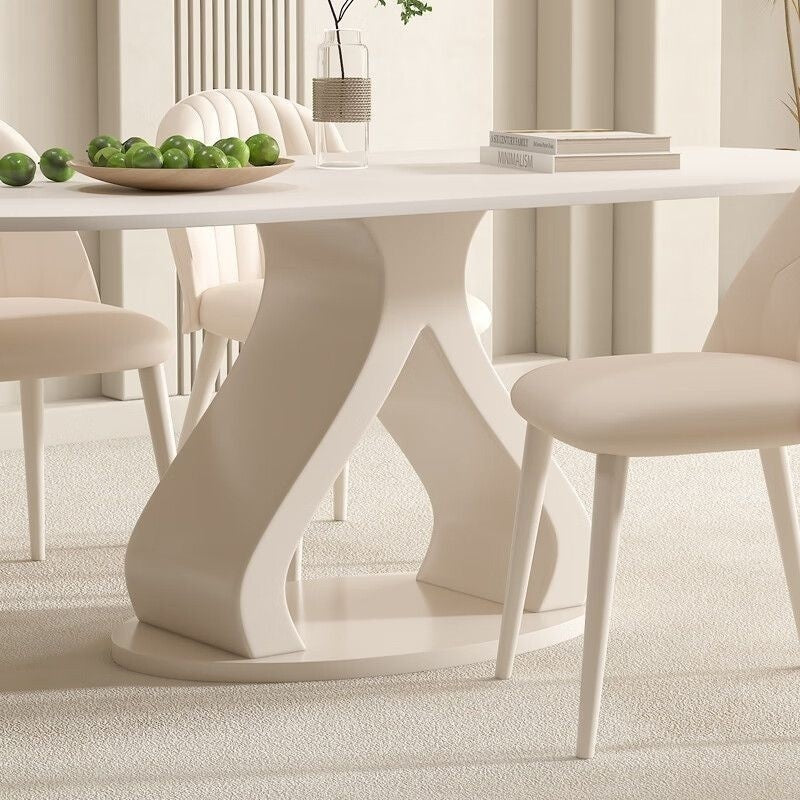 Luxurious French style minimalist stone table and chairs combination, high-end cream marble dining table, suitable for modern small families.