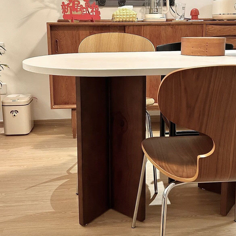 French-Nordic Style Oval Dining Table Set Simple and chic wooden table with chairs, suitable for small spaces.