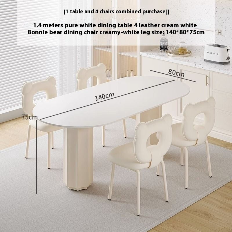 Cream Style Dining Table with Stone Top and Compact Elegant Chairs for Home Kitchen.