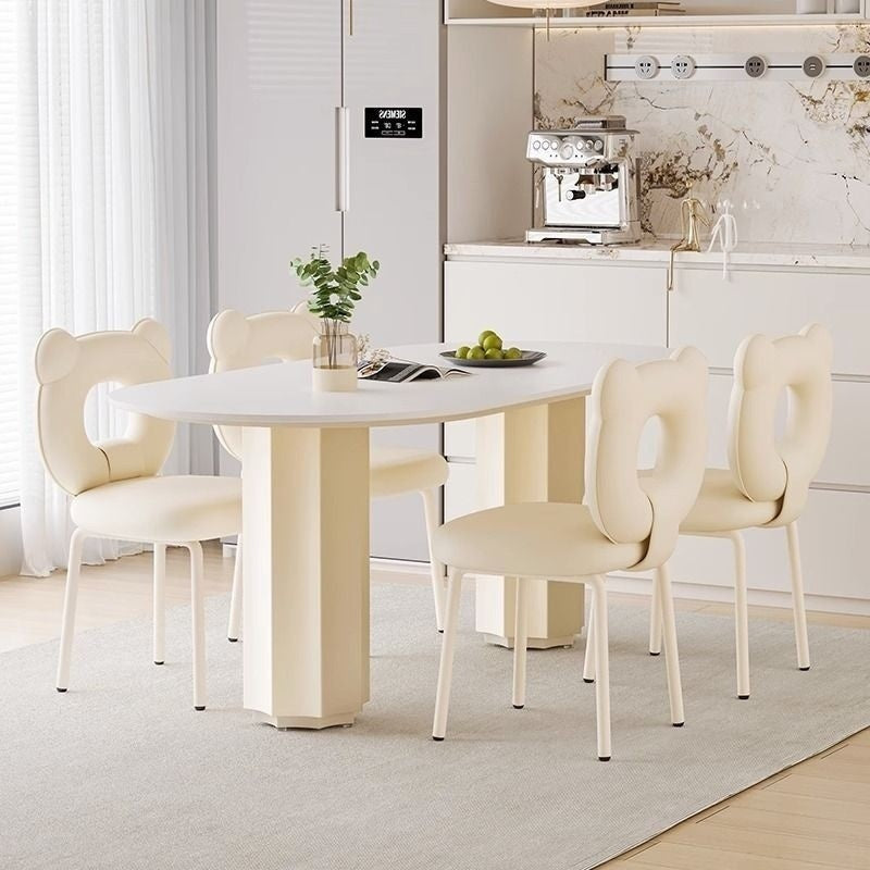 Cream Style Dining Table with Stone Top and Compact Elegant Chairs for Home Kitchen.