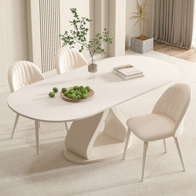 Luxurious French style minimalist stone table and chairs combination, high-end cream marble dining table, suitable for modern small families.