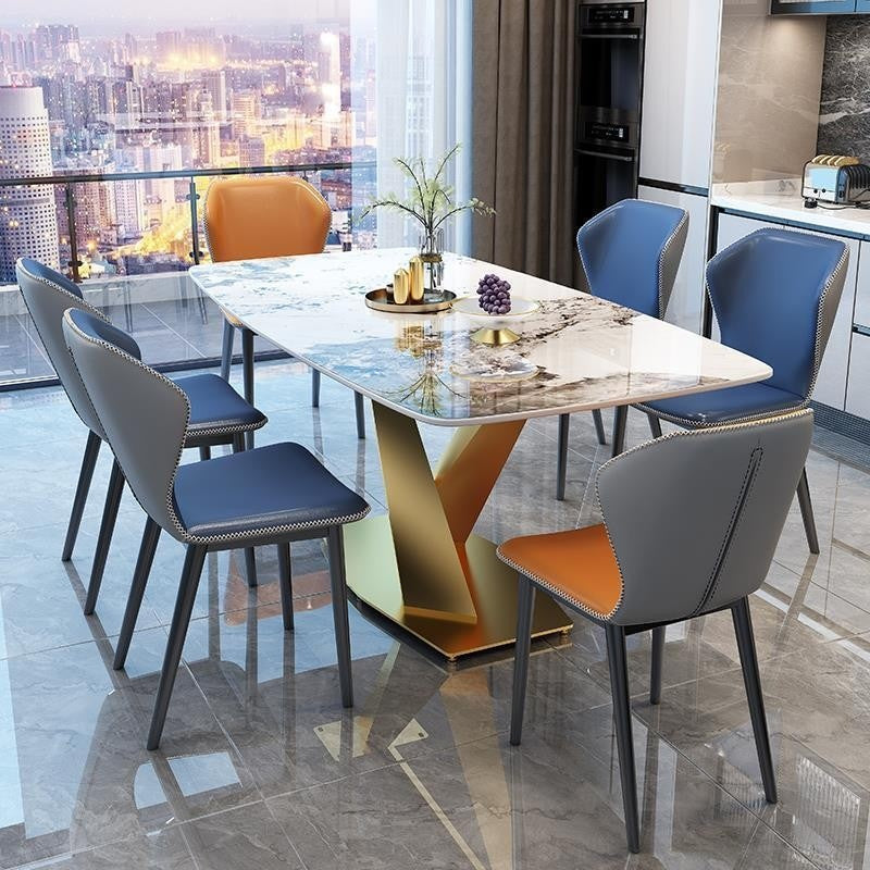 Italian dining table, luxurious, smooth surface, small artificial stone slab. Suitable for condos, stainless steel base, durable, modern.