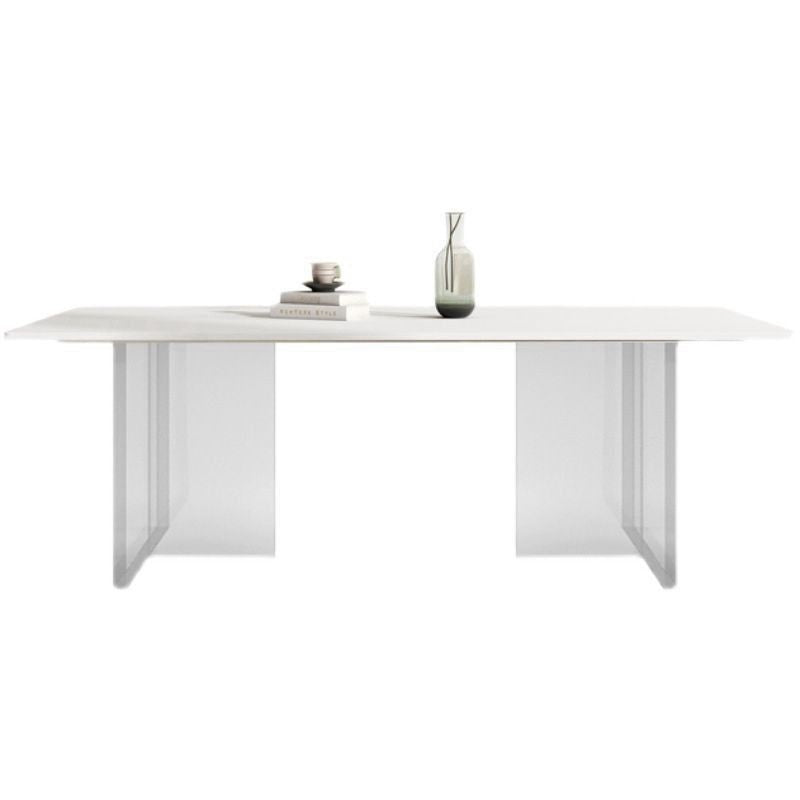 Modern dining table, floating style, minimalist design, acrylic or stone material, square shape, suitable for small homes.