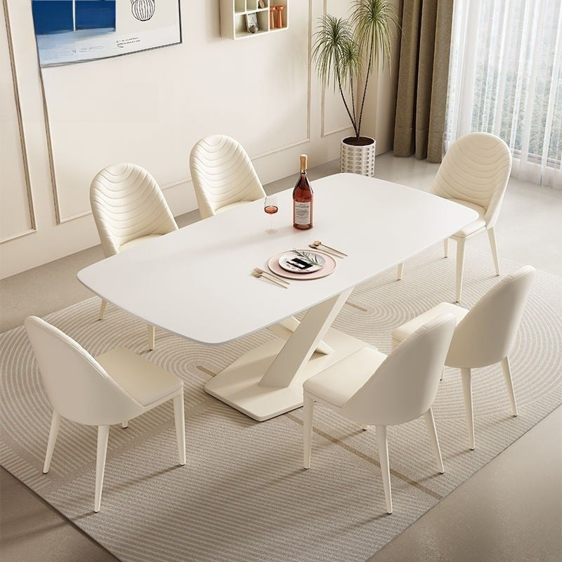 Modern dining set with table chairs and matching cream-white stone style – ideal for home use.