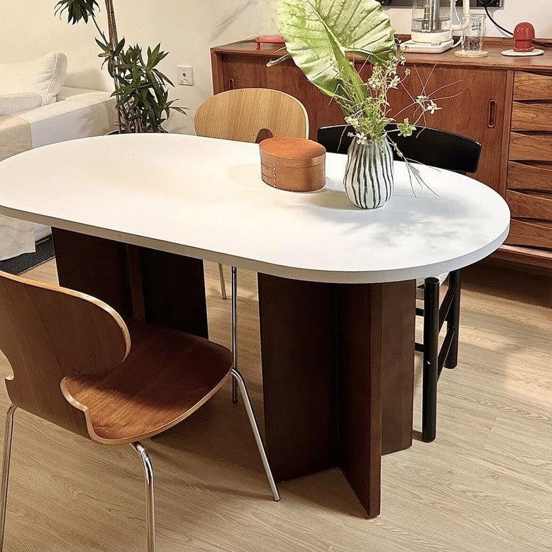 French-Nordic Style Oval Dining Table Set Simple and chic wooden table with chairs, suitable for small spaces.